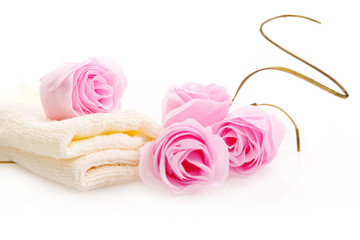 pink roses soap and white face towels