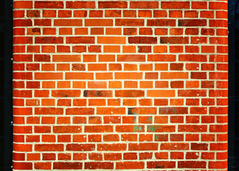 Brick wall with rounded edges as background.
