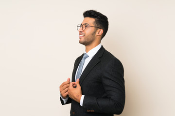 Young handsome businessman man over isolated background