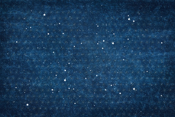 Beautiful starry blue background, Christmas texture with white stars and snow