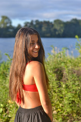 Young woman portrait at the sea side, summer time