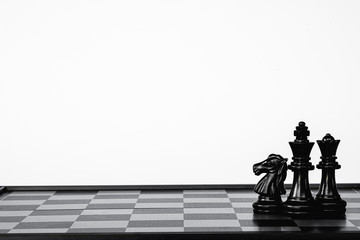 Fototapeta premium Black and White chess game. A move to kill. Refer to business strategy and competitive concept.