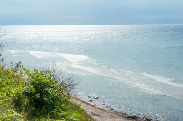 Beach and the sea view from the top of the cliff. Baltic sea shoreline in Poland