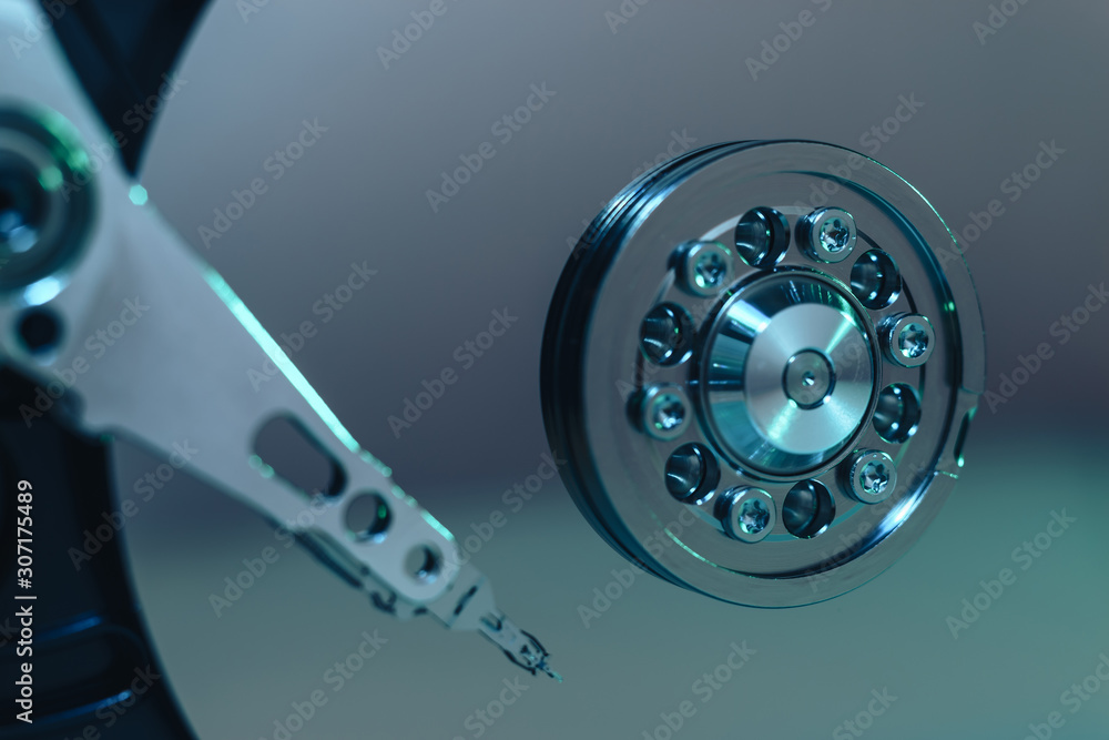 Aufkleber close up detail of an open hard disk background.