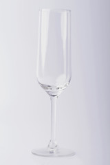 Glass on a white background. Glass on a white isolated background. Glass for alcoholic drinks.