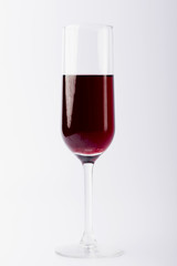 Glass on a white background. Glass on a white isolated background. Glass for alcoholic drinks.