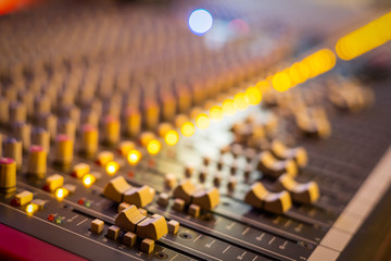 close up audiio mixing console. music background. recording, broadcasting concept