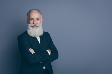 Portrait of his he nice attractive content cheerful cheery successful gray-haired man ceo boss chief company top director employer folded arms isolated over grey violet purple pastel color background