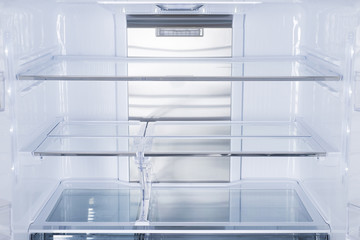 Fototapeta premium Refrigerator Isolated on White Background. Modern Kitchen and Domestic Major Appliances