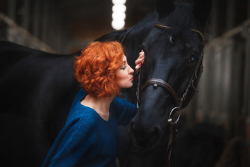 Fototapeta na wymiar red hair beautiful young woman lifestyle with best friend horse in countryside. portrait of paople and animals for pet life concept outdoor under the sun