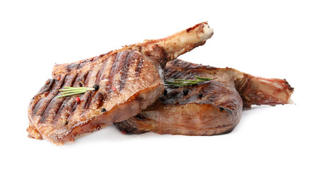 Delicious grilled beef steaks isolated on white