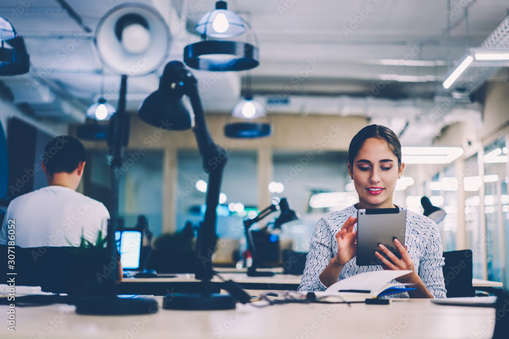 Poster skilled female employee making research via digital tablet analyzing information from network creati