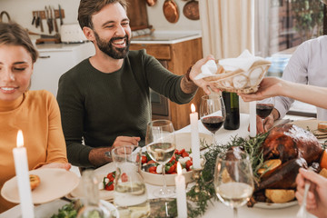 Happy big family celebrating Christmas together at home