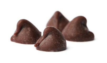 Delicious dark chocolate chips isolated on white