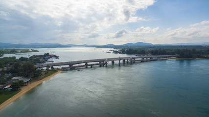 Fototapeta na wymiar aerial view Sarasin bridge connect Phang Nga province to Phuket island. .The old bridge was renovated to be a tourist attraction and a viewpoint in the middle of the sea..