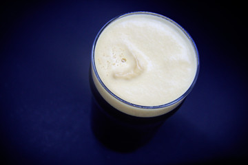 Black beer on black background