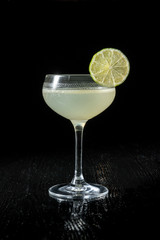 Classic daiquiri on the dark background. Luxury craft drink.