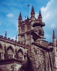 Statue in front of an old cathedral