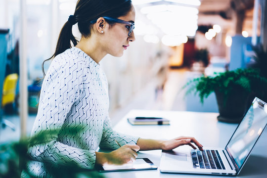 Professional Female Manager Of Clinic Planning Schedule For Visitors Using Application On Laptop Computer,serious Administrative Noting Information Using Technology At Working Place In Office