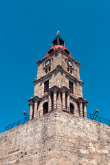 Casual view on the old building at the streets of the Rhodes island at sun weather