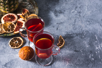 Obraz na płótnie Canvas mulled wine a delicious holiday with spices from orange cinnamon and star anise. Traditional hot drink