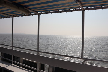 Ocean view from window of a cruise ship. Scenic view of horizon over the sea.