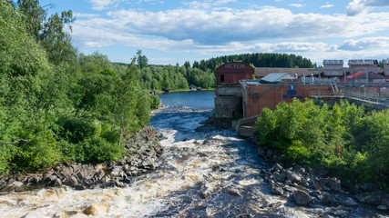 Fototapeta na wymiar Hydroelectric power station in the city of Lyaskelya in Karelia