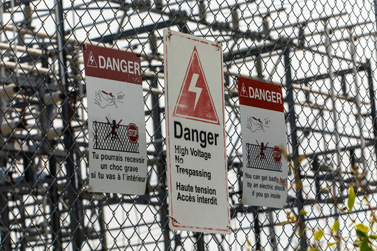 e up on high voltage electrical substation warning signs, Danger Signage, two languages Signage, French and English, Quebec, Canada