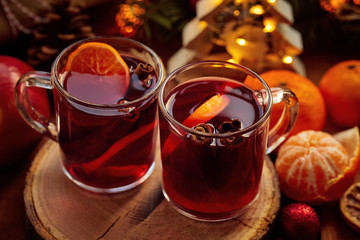 Top view of two glasses of hot mulled wine on christmas table