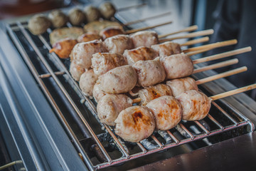 Thai meatball and pork sausage with vegetables cabbage and ginger