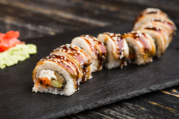 Delicious rolls with fish and cheese	