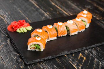 Delicious rolls with fish and cheese	