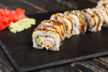 Delicious rolls with fish and cheese	