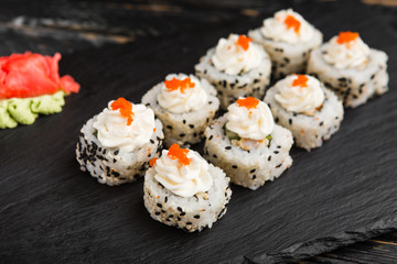 Delicious rolls with fish and cheese	