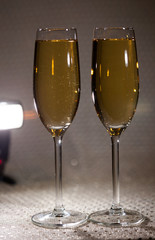 Drink. Two glasses white wine, light background