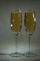 Drink. Two glasses white wine, light background