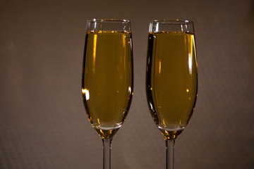 Drink. Two glasses white wine, light background