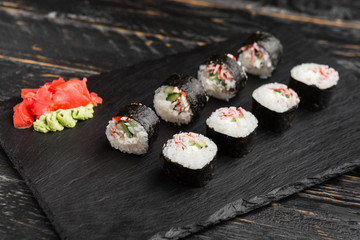 Delicious rolls with fish and cheese	