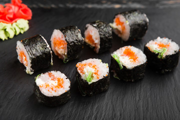 Delicious rolls with fish and cheese	