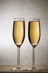 Drink. Two glasses white wine, light background