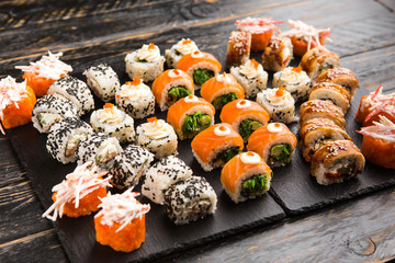 Delicious rolls with fish and cheese	