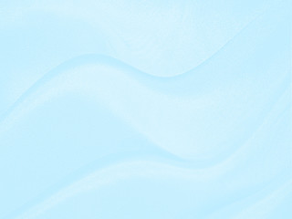 The surface of the fabric Resulting in a bright blue tone, Wave pattern, Abstract blue fabric background.