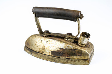 Old electric iron isolated on a white background.