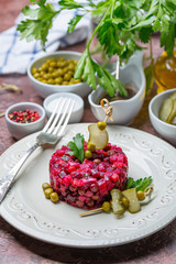  Beetroot salad with beetroot, potato, carrot, pea and oil dressing.