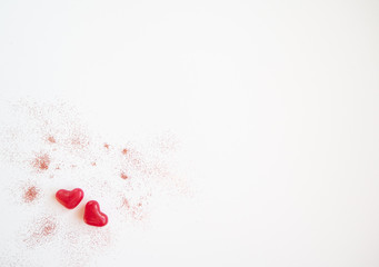 Valentines day card with tiny candy sweet hearts on white background. Flat lay, top view, copy space. 