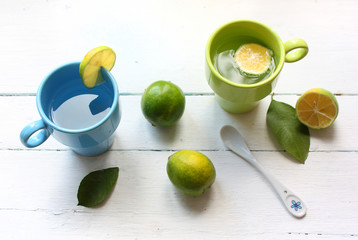 tea with lemon and mint on the wooden table