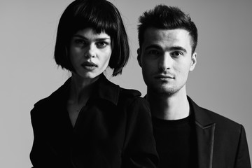 portrait of young man and woman