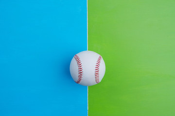 baseball on green and blue background