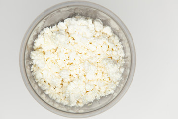 Cottage cheese isolated over white background