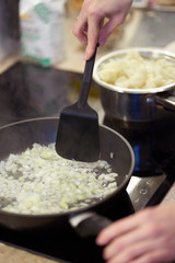 Chopped onions fried on a plate